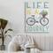 Stupell Industries Life's A Journey Blue Bicycle Flower Basket Canvas Wall Art